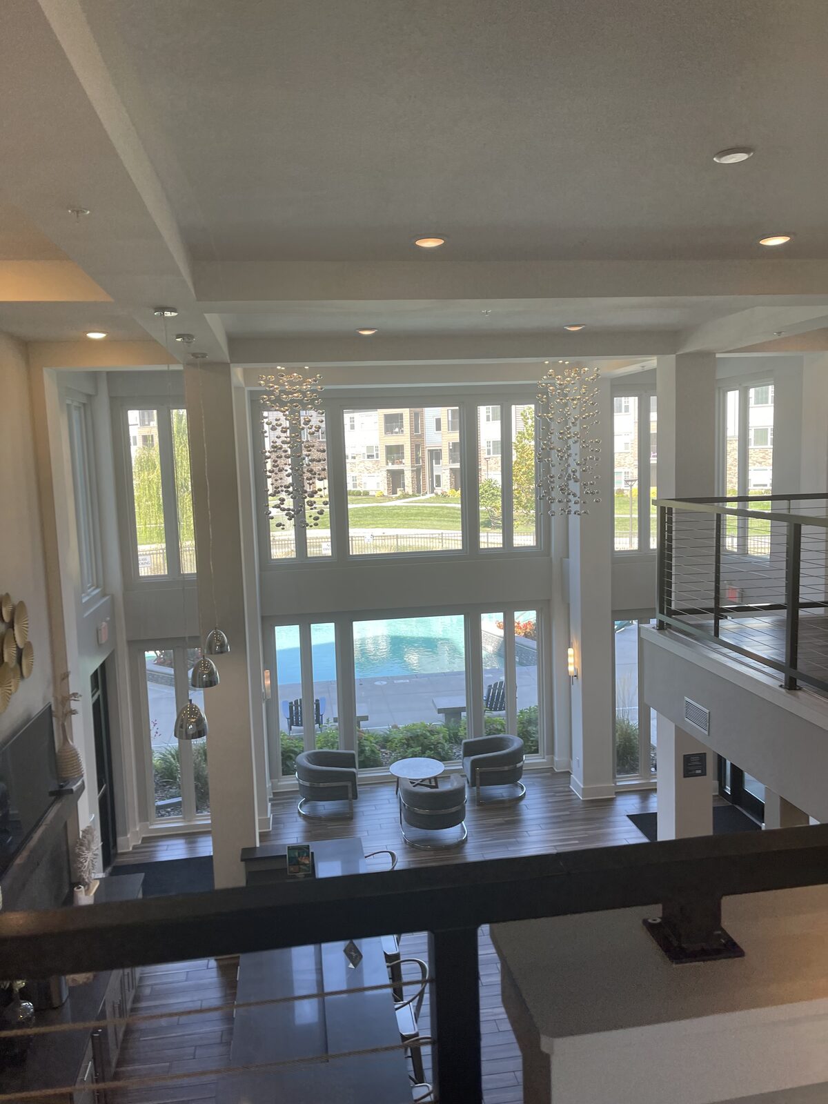 A clubhouse lobby with lounge seating at a Convivium Living community