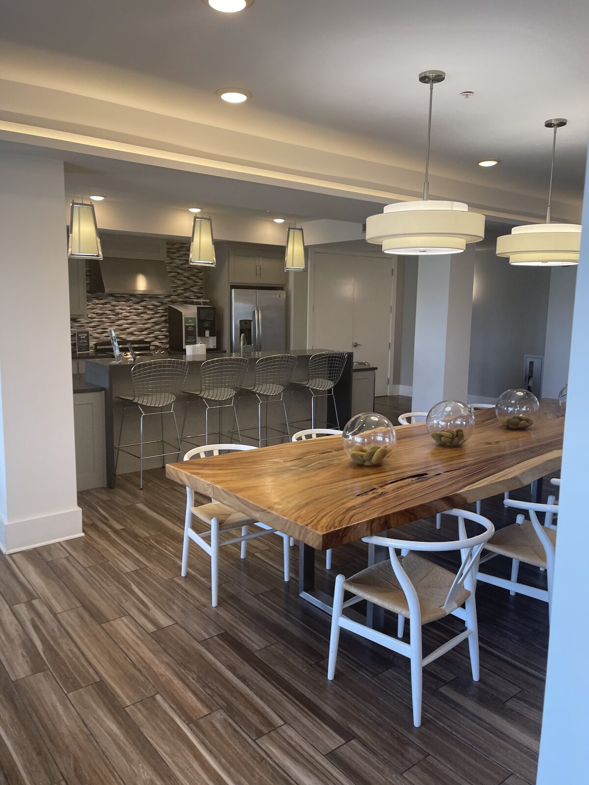 A communal dining and kitchen area at a Convivium Living community