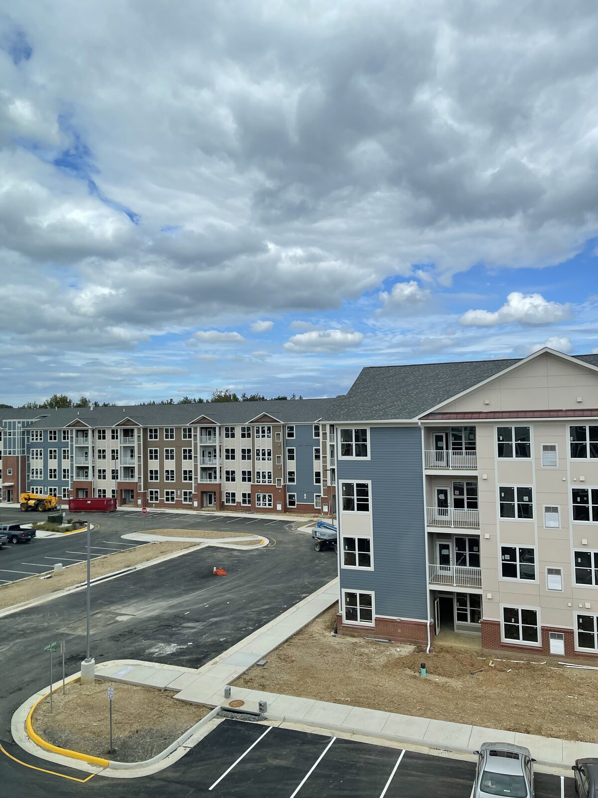 A multi-building apartment complex under construction