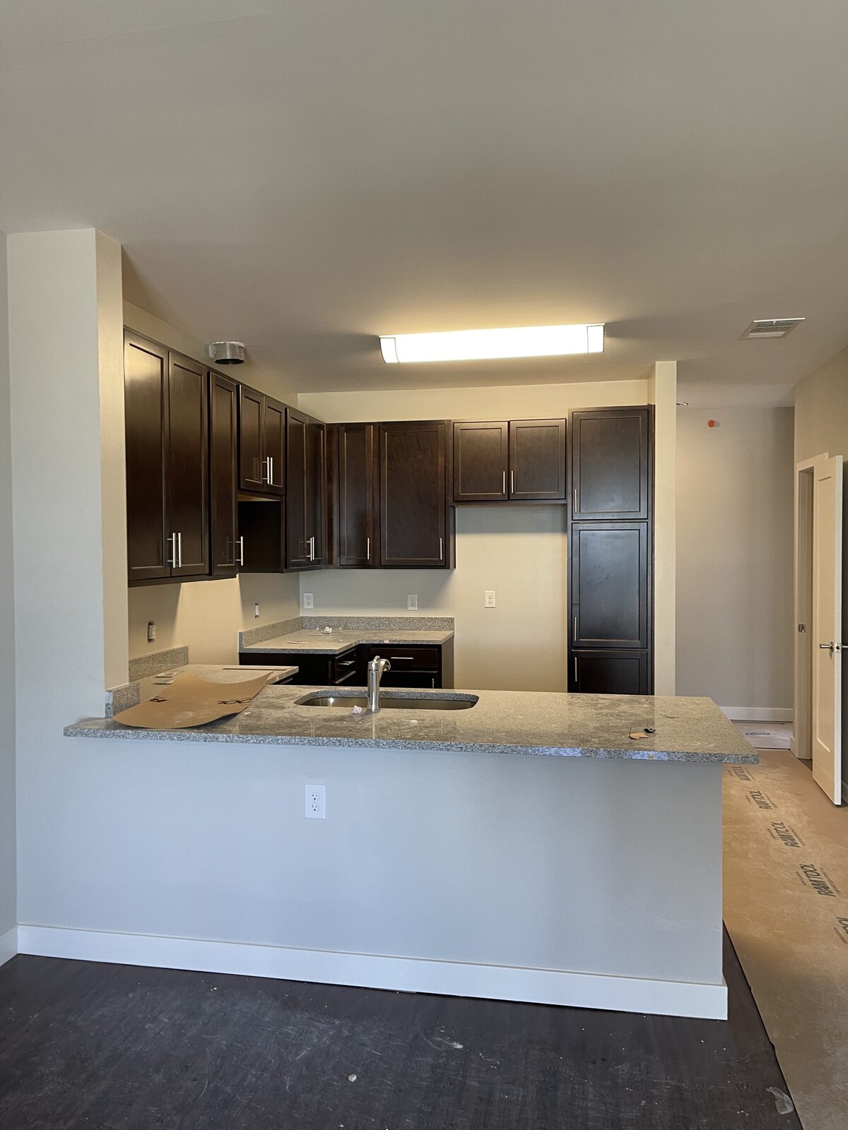 A kitchen mid-installation at a Convivium Living community
