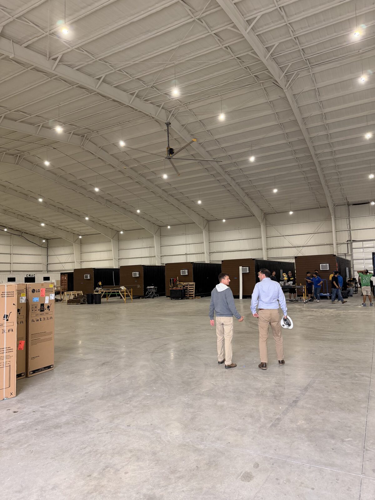 Modular housing units staged inside a fabrication facility
