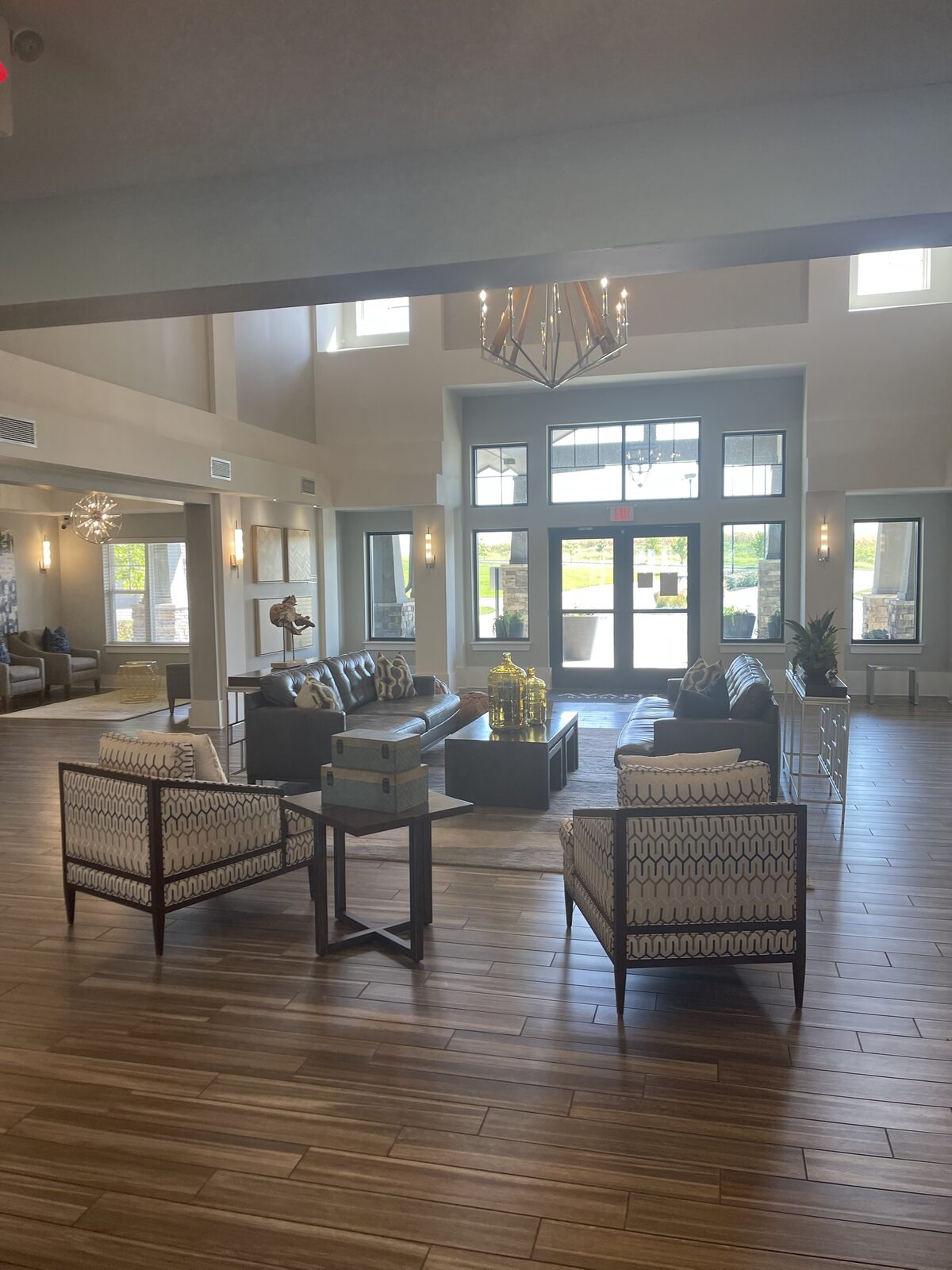 A bright DK Homes clubhouse lounge with seating