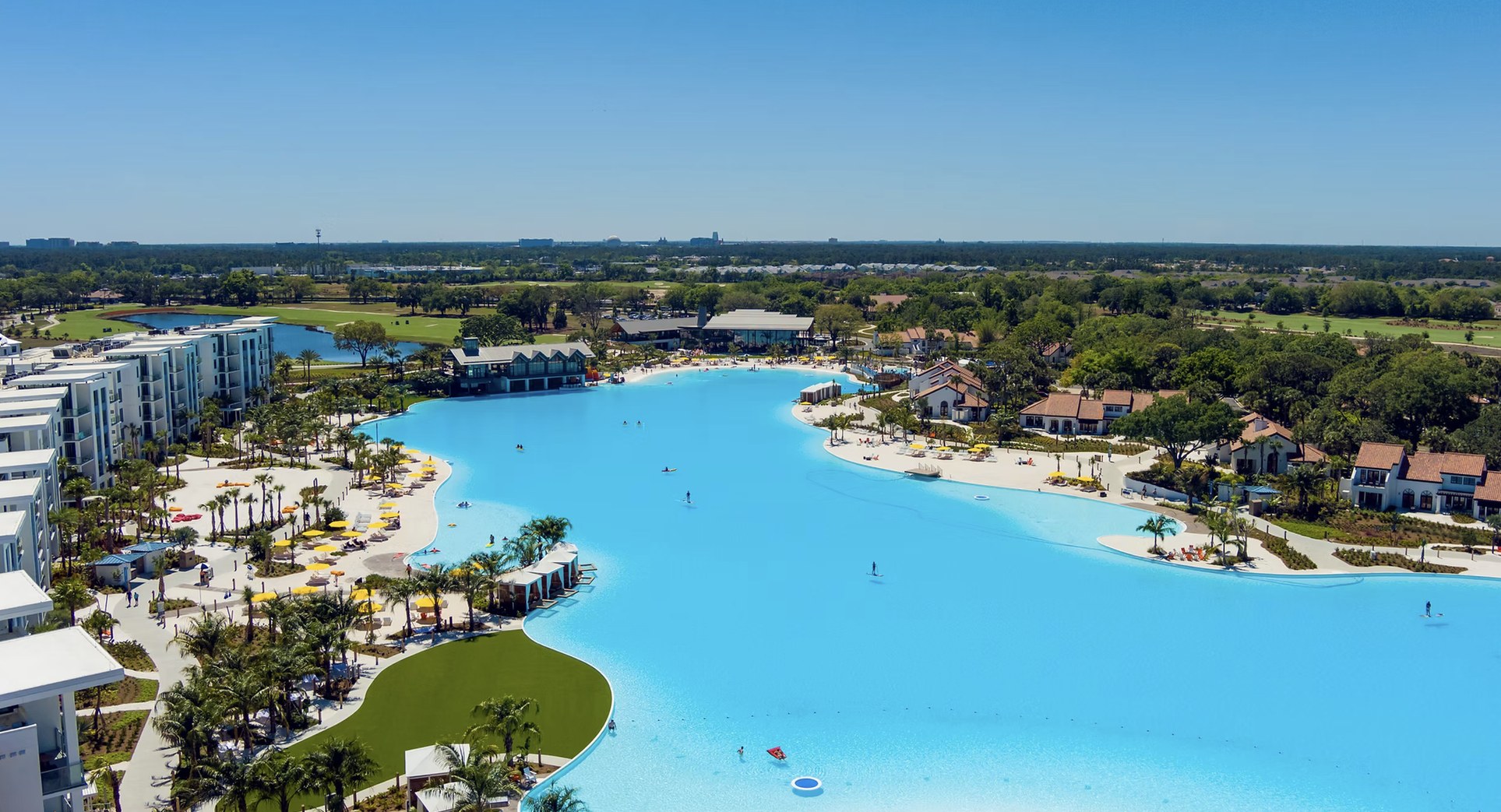 Aerial view of Evermore Orlando Resort's 20-acre private beach and lagoon