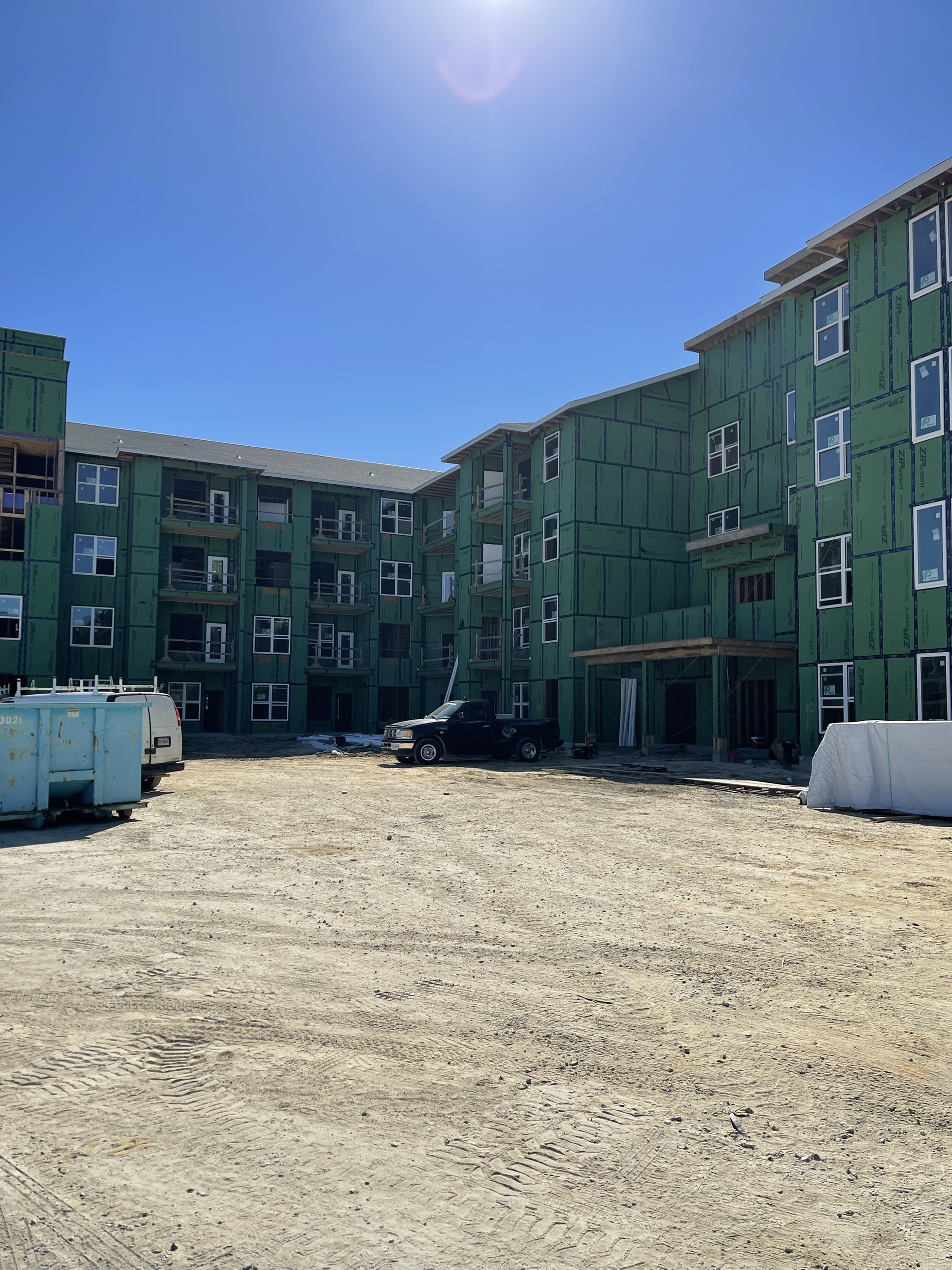 The courtyard between two Greenview Residences buildings during construction