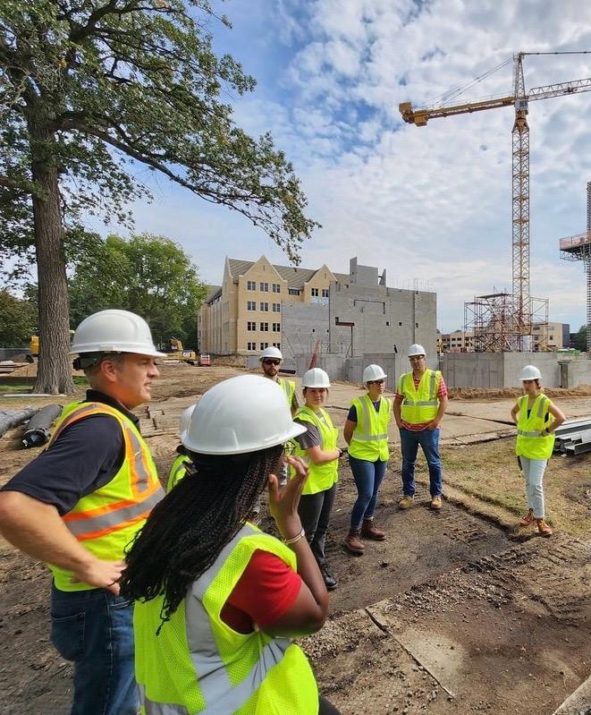 The Kaufman Development team on a site visit at an active construction site