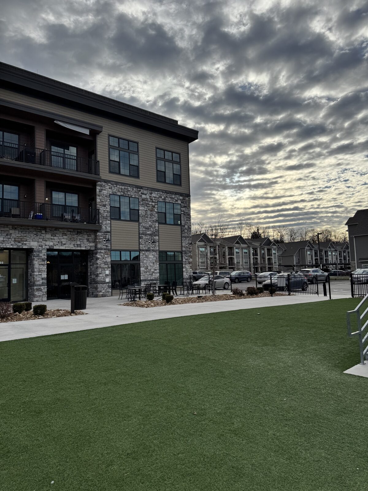 A Kaufman Development apartment building at dusk