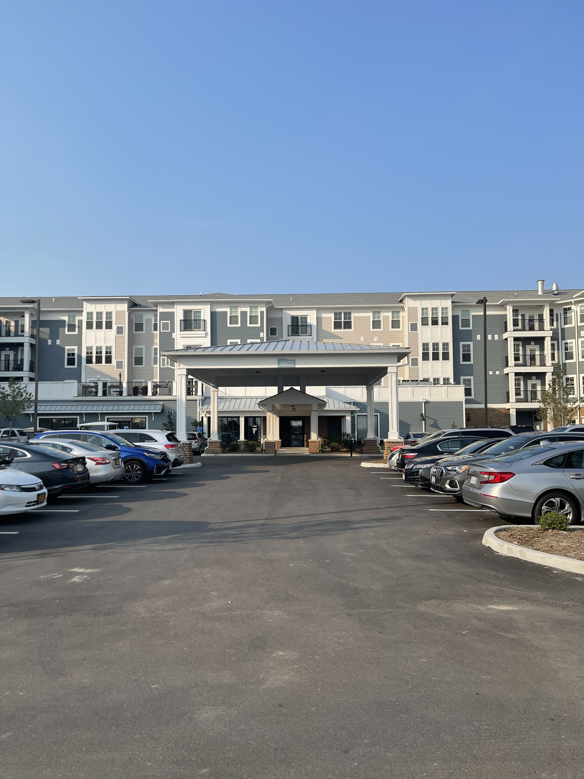 A covered portico welcoming residents home, the entrance that sets the tone for a Kaufman Development community
