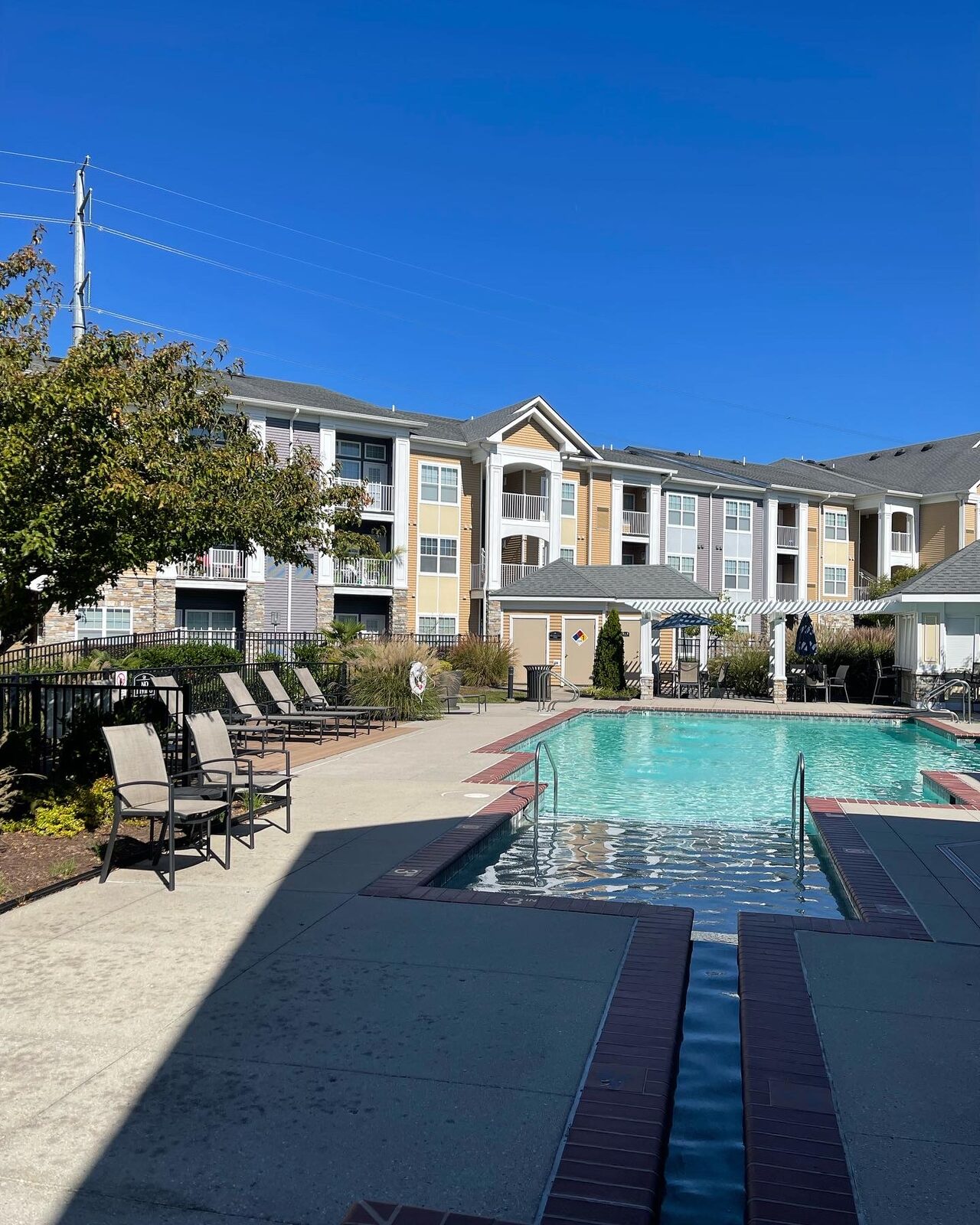 A community pool area at a completed Kaufman Development property