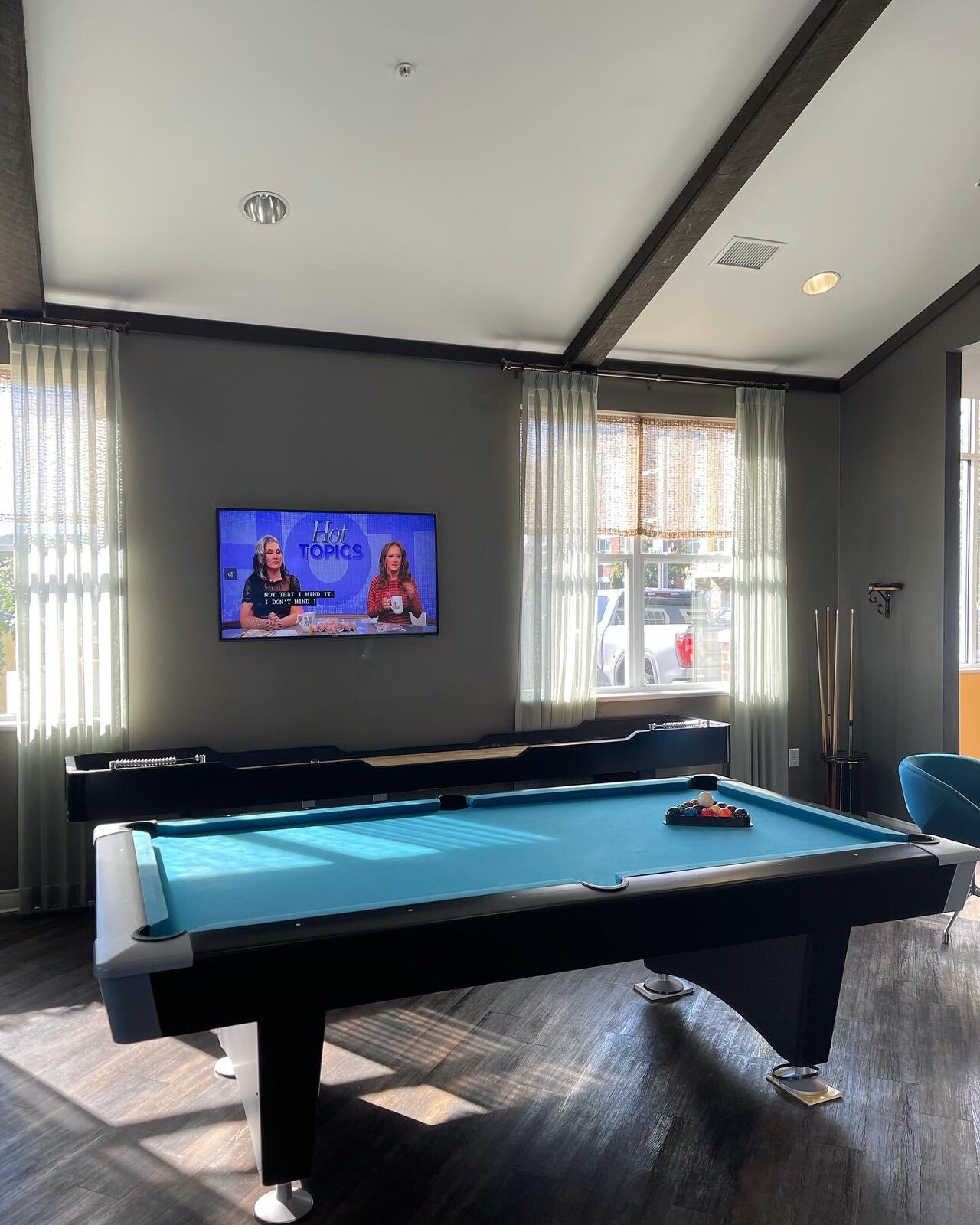 A resident game room at a completed Kaufman Development property