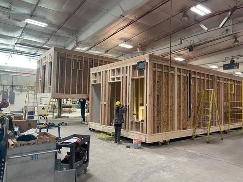 A wood-framed module under construction inside Oldivai's factory for the Project Zero pilot