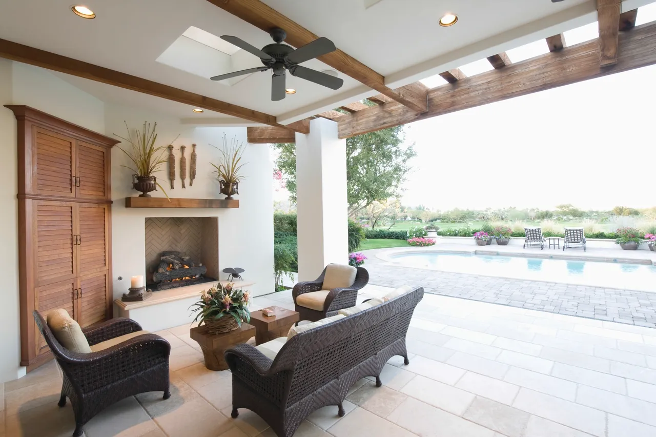 Cozy patio overlooking swimming pool