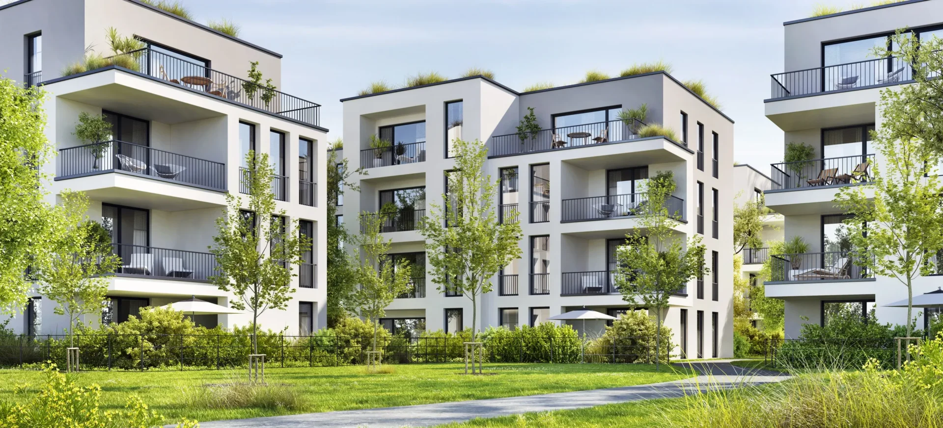 Modern apartment buildings with green surroundings