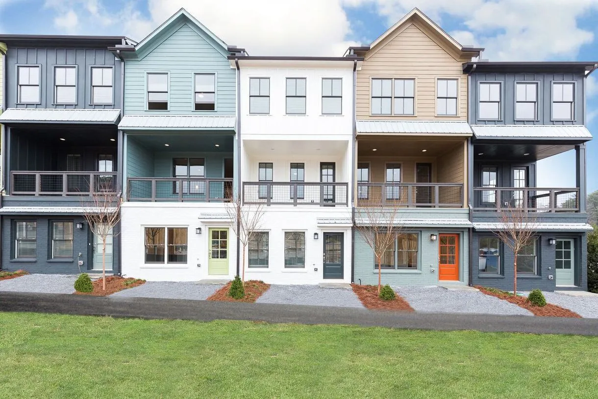 Colorful townhouses with porches