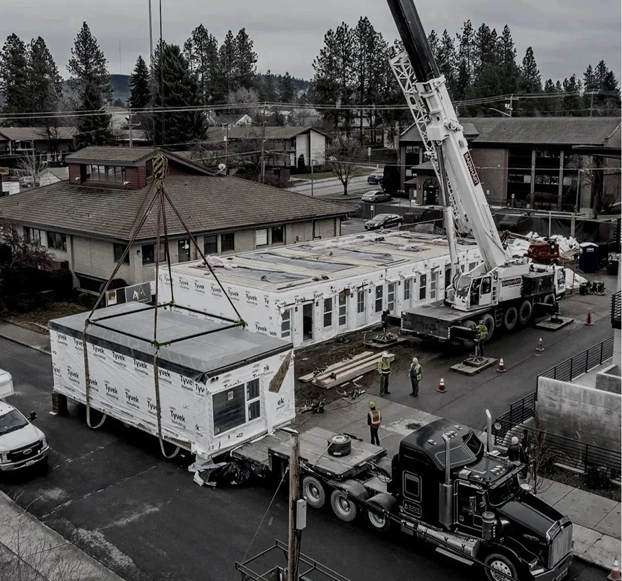 Crane lifting modular building section