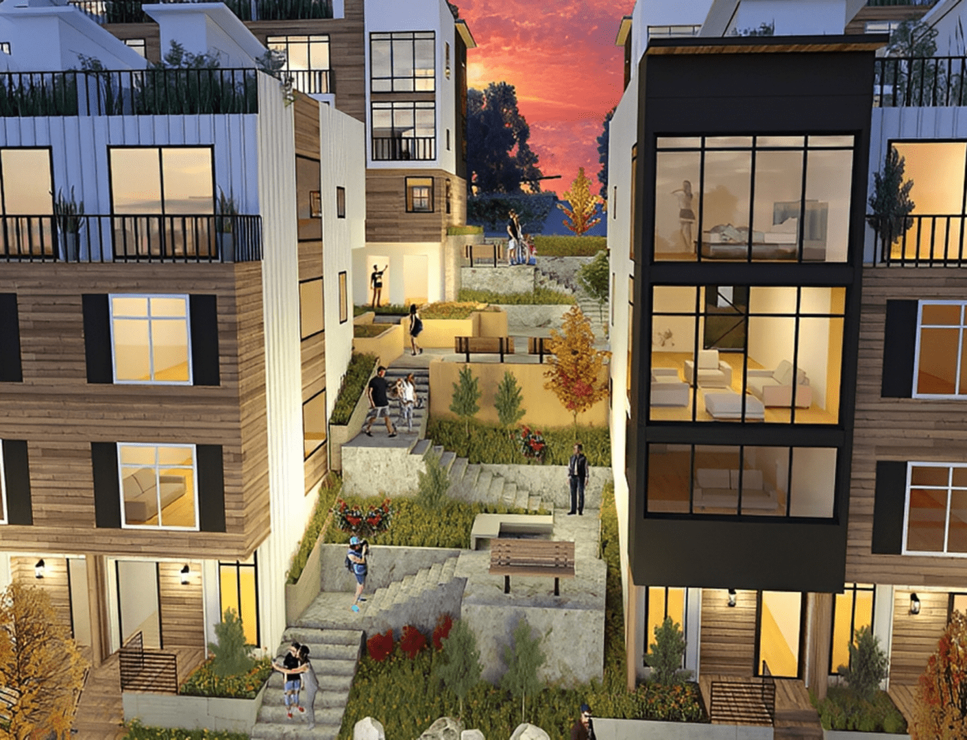 Modern townhouses with landscaped courtyard at sunset.