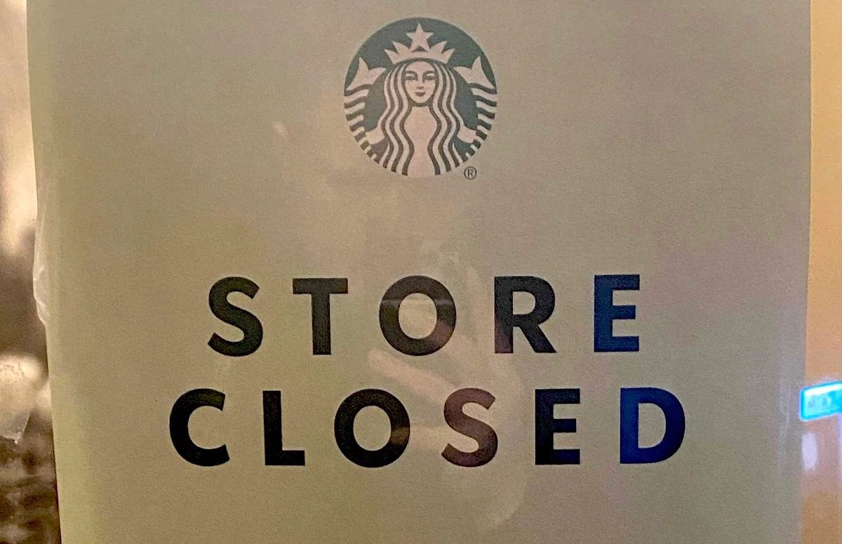 Store closed sign with logo