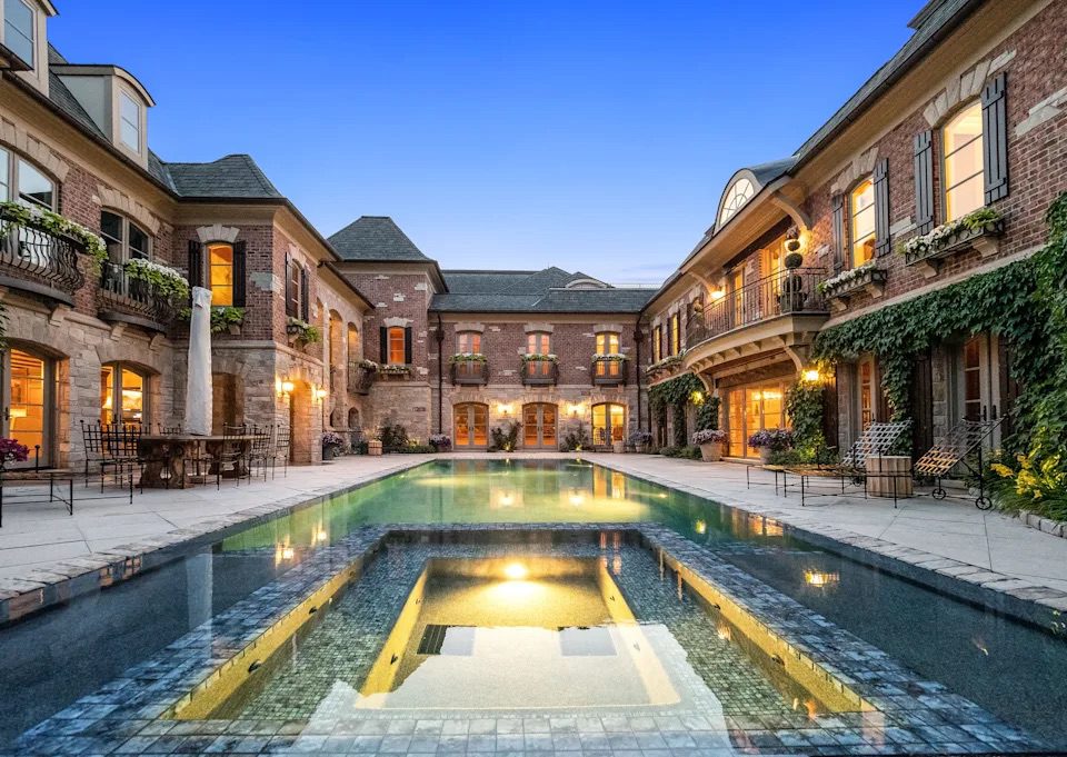 Elegant brick mansion and central pool