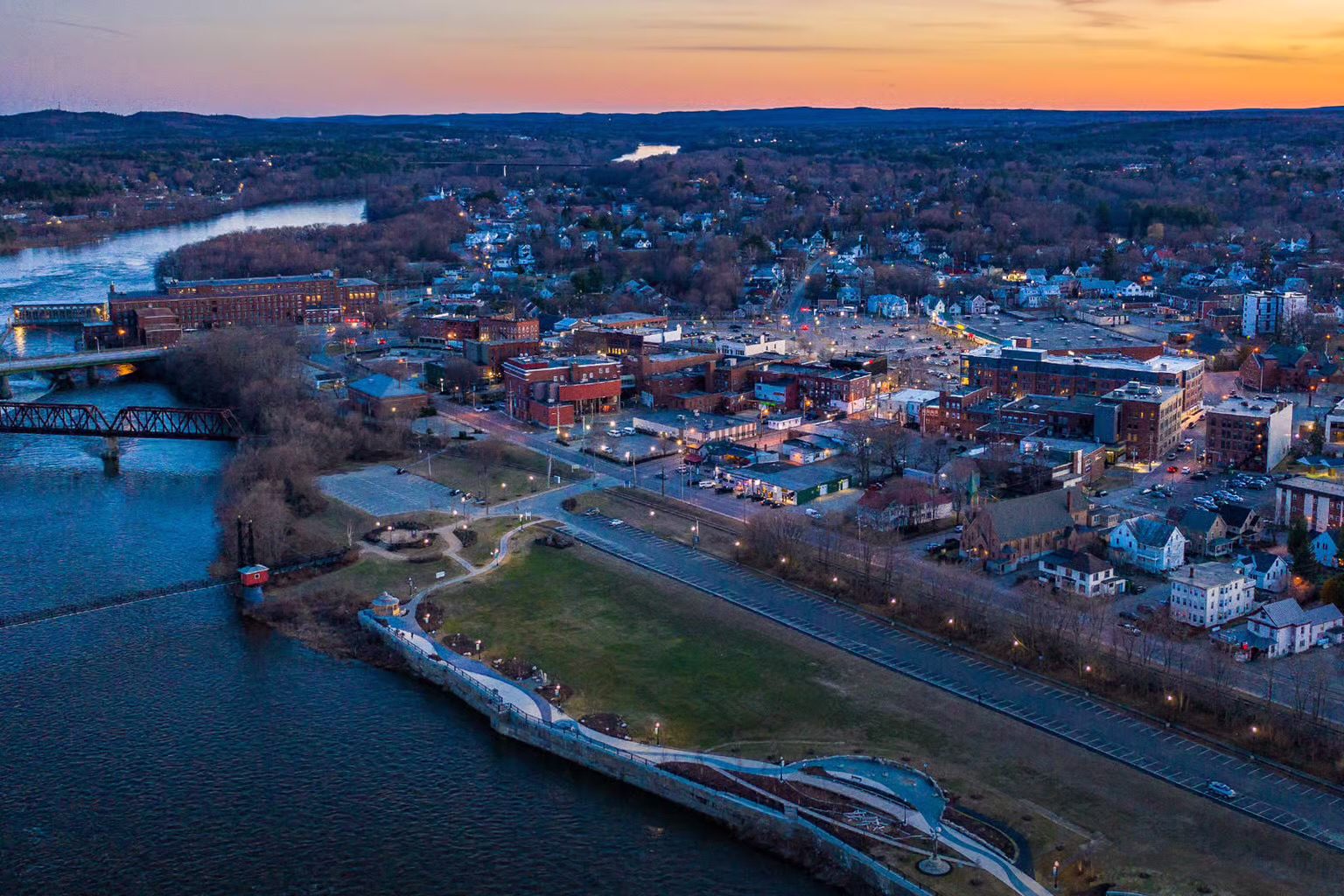 Twilight over small riverside city