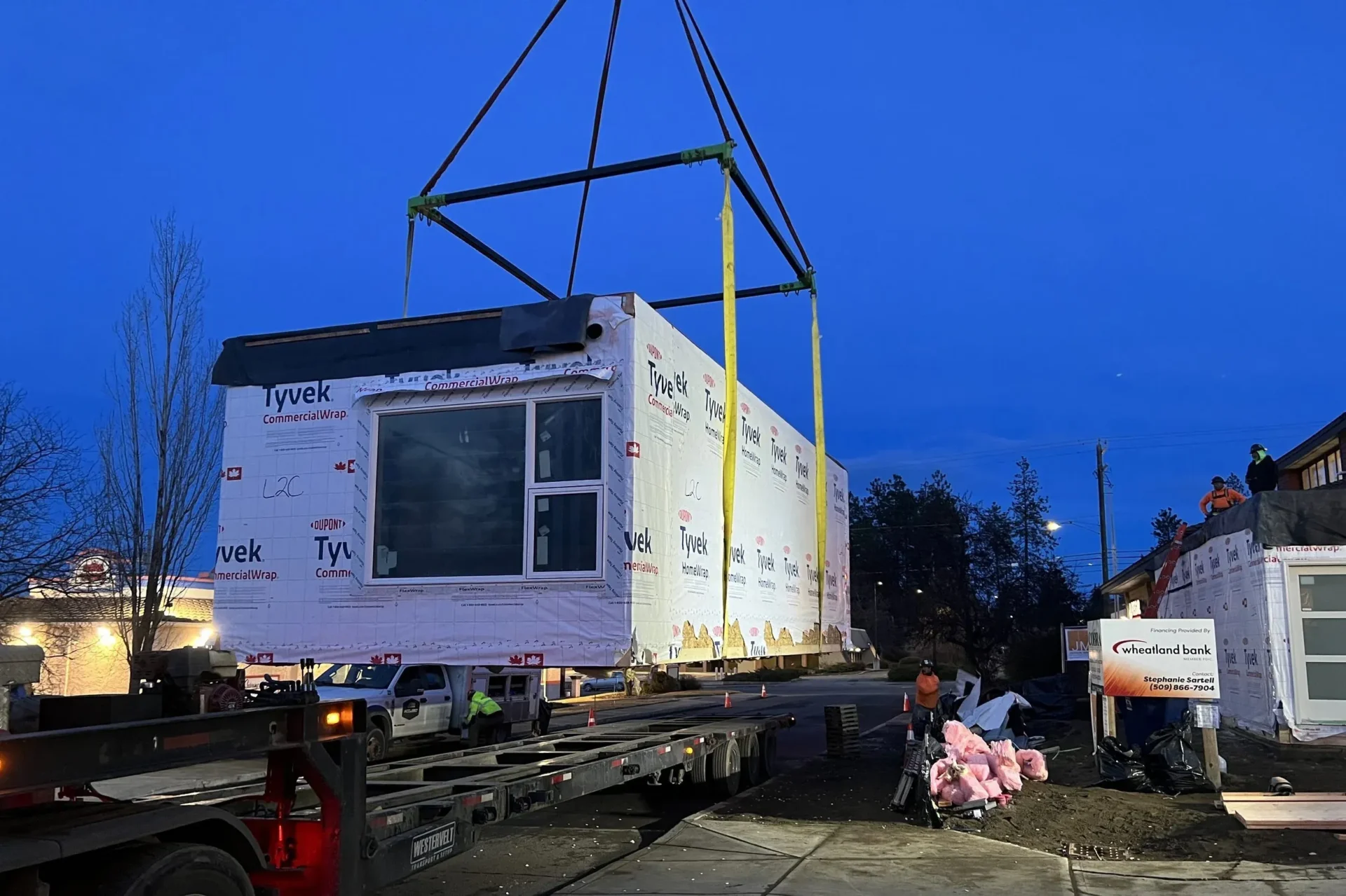 Prefabricated building section on a truck