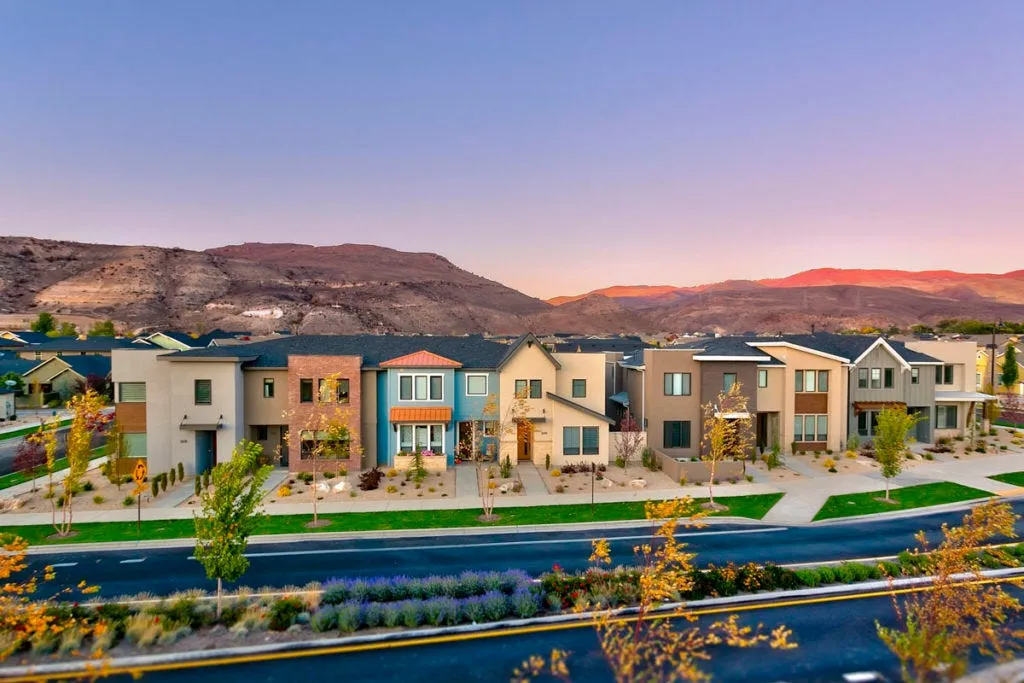 Modern homes with mountain backdrop